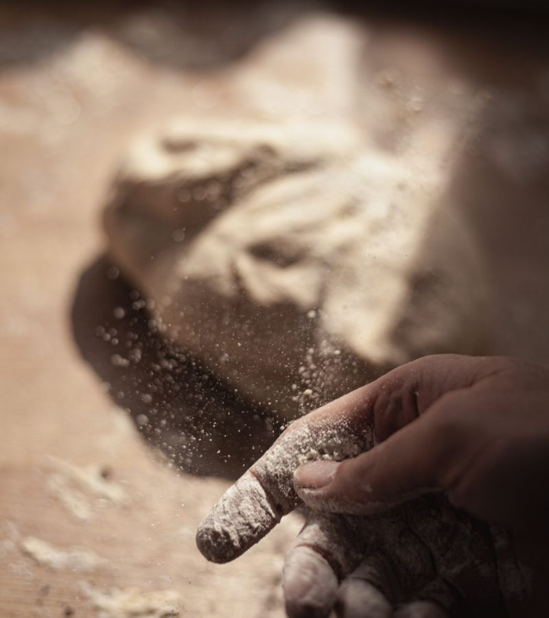 image of a baker's hands with flour